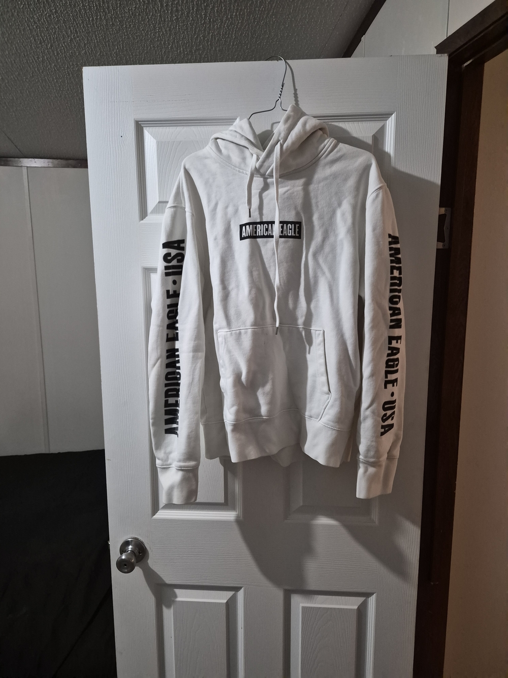 American Eagle Outfitters White Hoodie with Black Logo and Sleeve Text